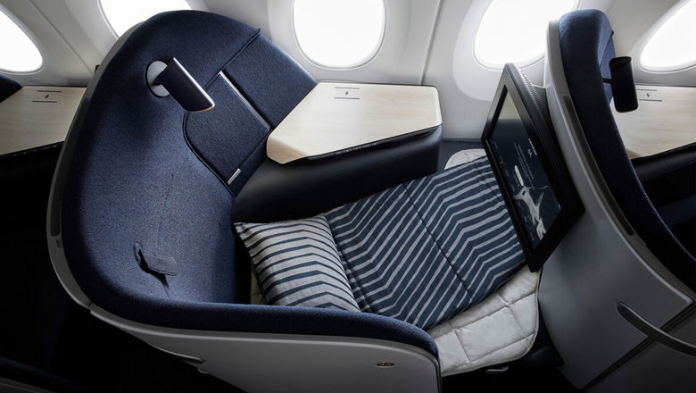 The AirLounge business-class seat offers a fixed, contoured design with a width enabling passengers to sit cross-legged, lie flat or enjoy additional workspace.