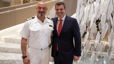 The Vista's captain, Luca Manzi, with Oceania Cruises president Frank A. Del Rio