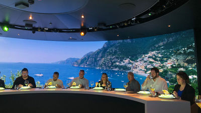 Scenes of the Amalfi Coast surround guests on their culinary journey.