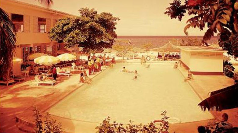 When Butch Stewart renovated, rebuilt and reopened the Bay Roc Hotel in 1981 as Sandals Montego Bay, it became the first of the Sandals brand and the first all-inclusive resort for couples in Jamaica. Here's a look back, and ahead, at the property. Pictured, the pool at Bay Roc Inn, in April 1981, prior to its reopening as the Sandals Montego Bay.