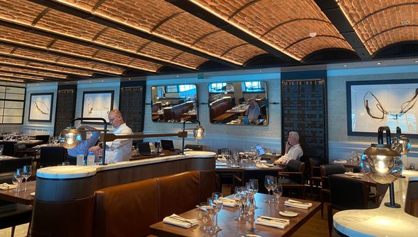 The new Ember restaurant has an industrial ambience and serves American-style cuisine.